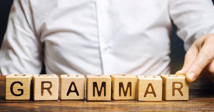 Building blocks spelling out the word 'grammar'