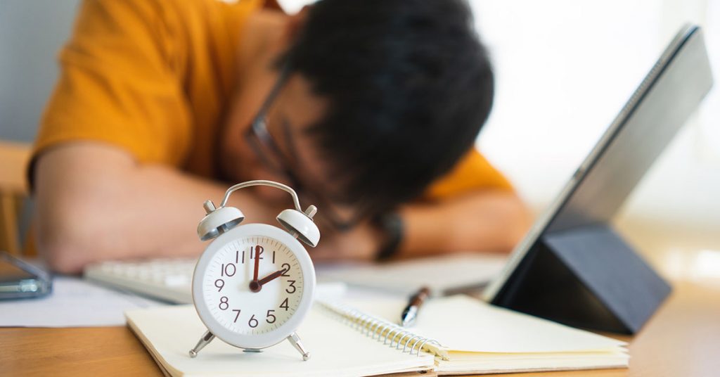 Man taking a nap before learning a language