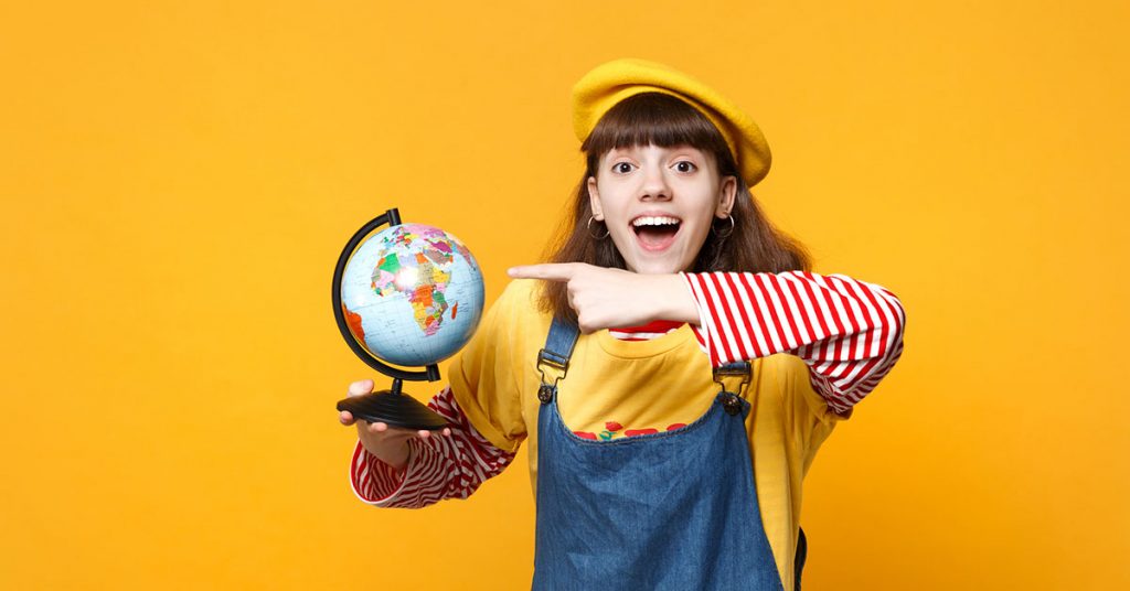 French girl with globe